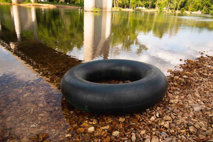 Tubes floating inner river stock tubing alamy selective focus old