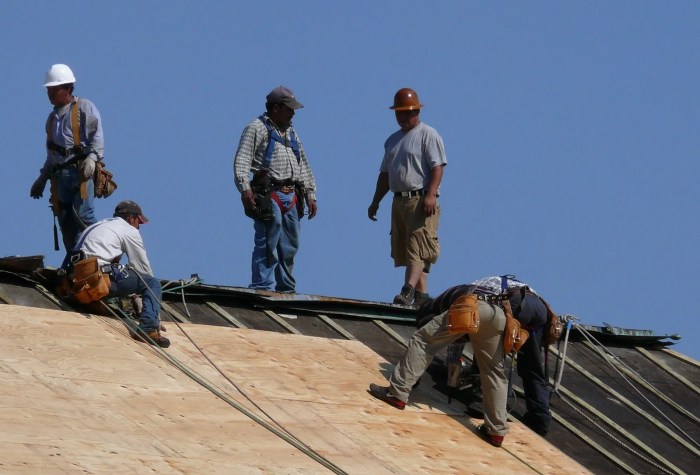 Roofers knocking on doors