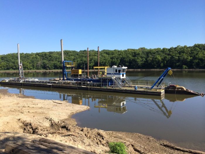 Excavating lake from river