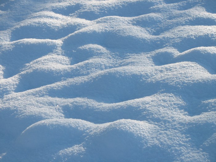 White covering on a mountain