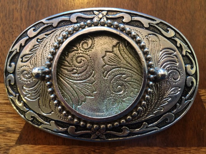 Silver dollar western belt buckle